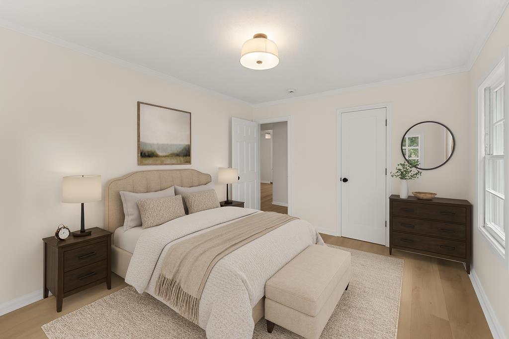 5915 Frazier Drive Columbus, GA 31909 - Photo 17 of 28 a bedroom with a bed and a lamp