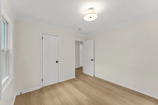 a view of a room that has a window in it