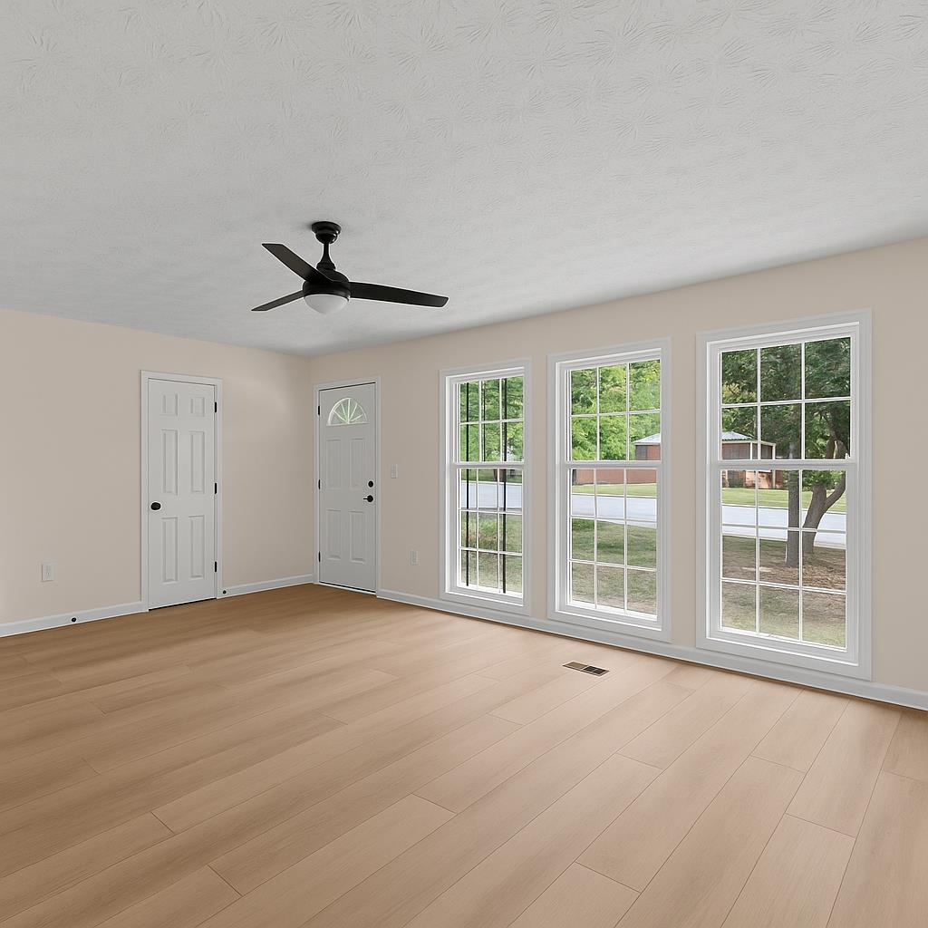 5915 Frazier Drive Columbus, GA 31909 - Photo 5 of 28 a view of an empty room with a window