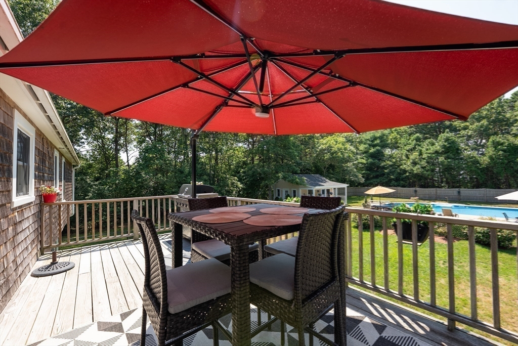 67 Roxy Cahoon Road Plymouth, MA 02360 - Photo 26 of 37 a view of balcony with deck and outdoor seating