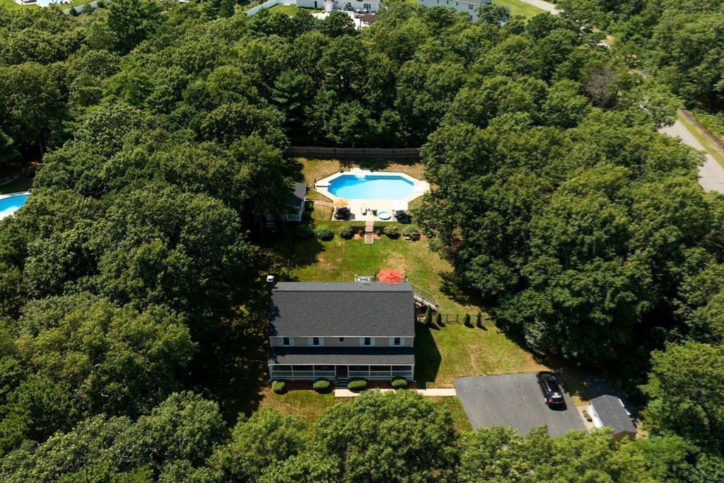 67 Roxy Cahoon Road Plymouth, MA 02360 - Photo 29 of 37 an aerial view of a house with a yard and garden