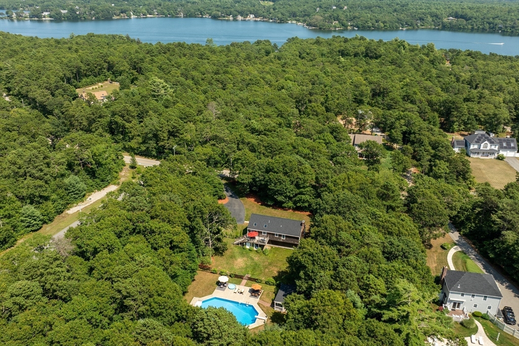67 Roxy Cahoon Road Plymouth, MA 02360 - Photo 3 of 37 an aerial view of a house with a yard
