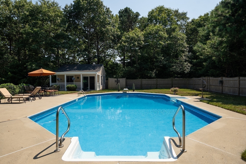 67 Roxy Cahoon Road Plymouth, MA 02360 - Photo 32 of 37 a view of a house with swimming pool and sitting area