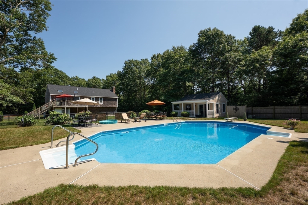 67 Roxy Cahoon Road Plymouth, MA 02360 - Photo 33 of 37 a view of a swimming pool with chairs