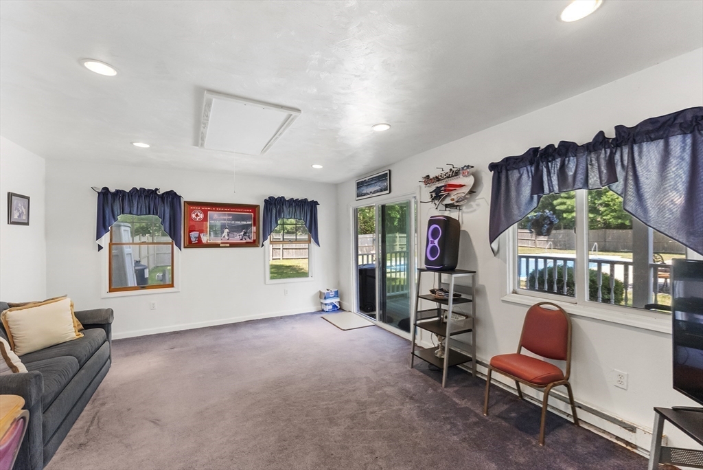 67 Roxy Cahoon Road Plymouth, MA 02360 - Photo 35 of 37 a view of a livingroom with furniture and windows