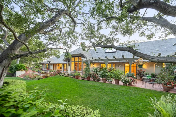 a view of a big yard in front of house