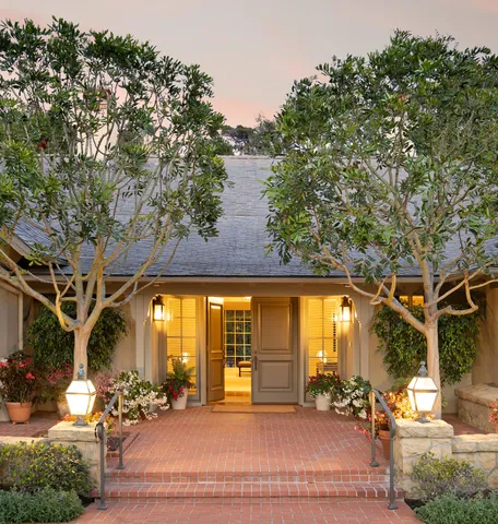 a view of a building with sitting area