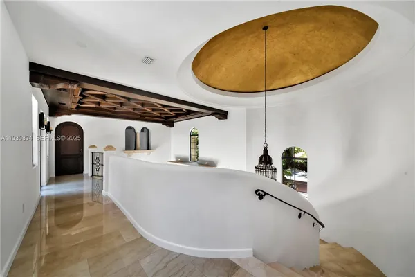 a room with a table and chairs