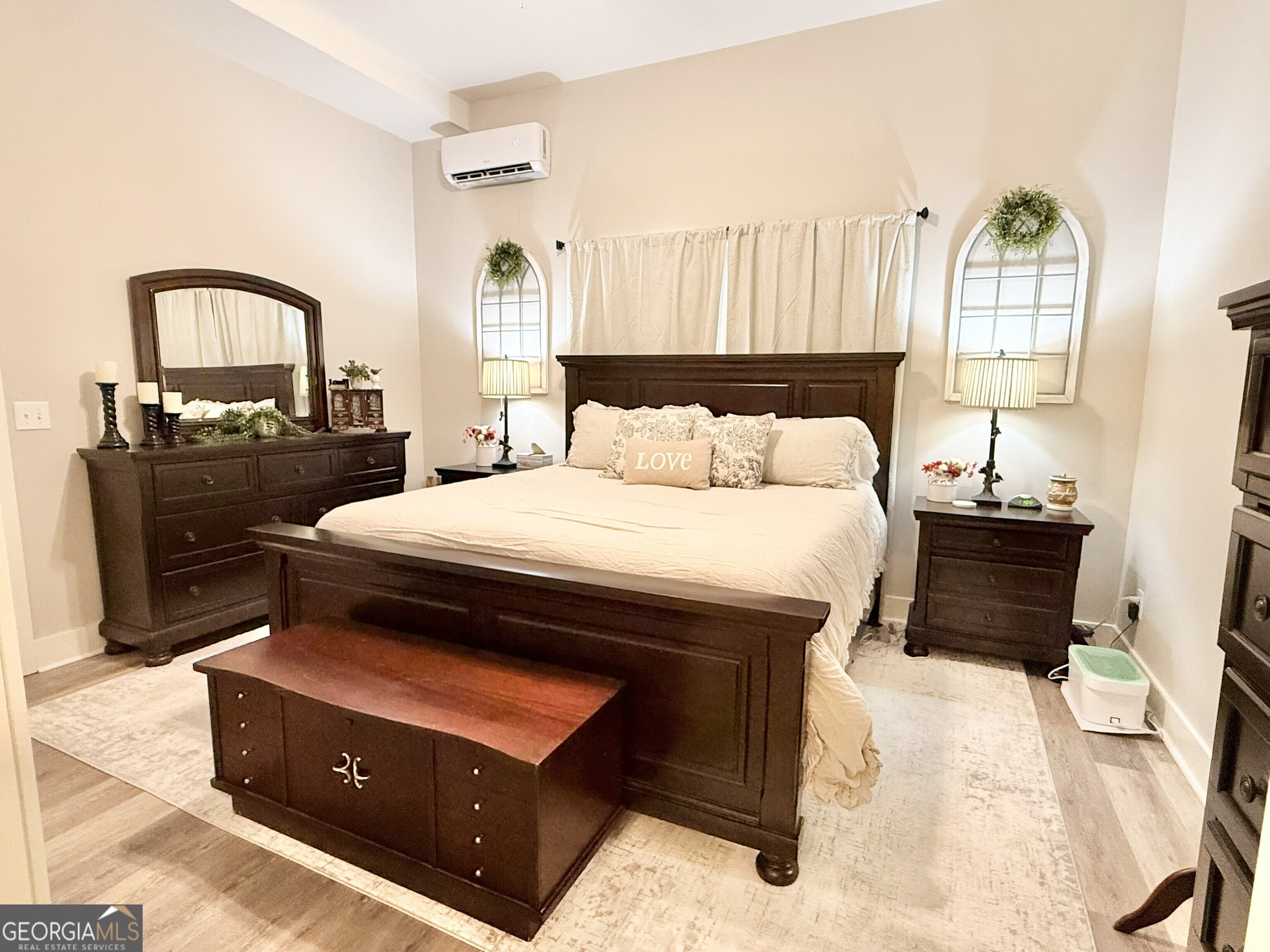 919 West Milner Road Concord, GA 30206 - Photo 35 of 40 a bedroom with a bed and wooden floor