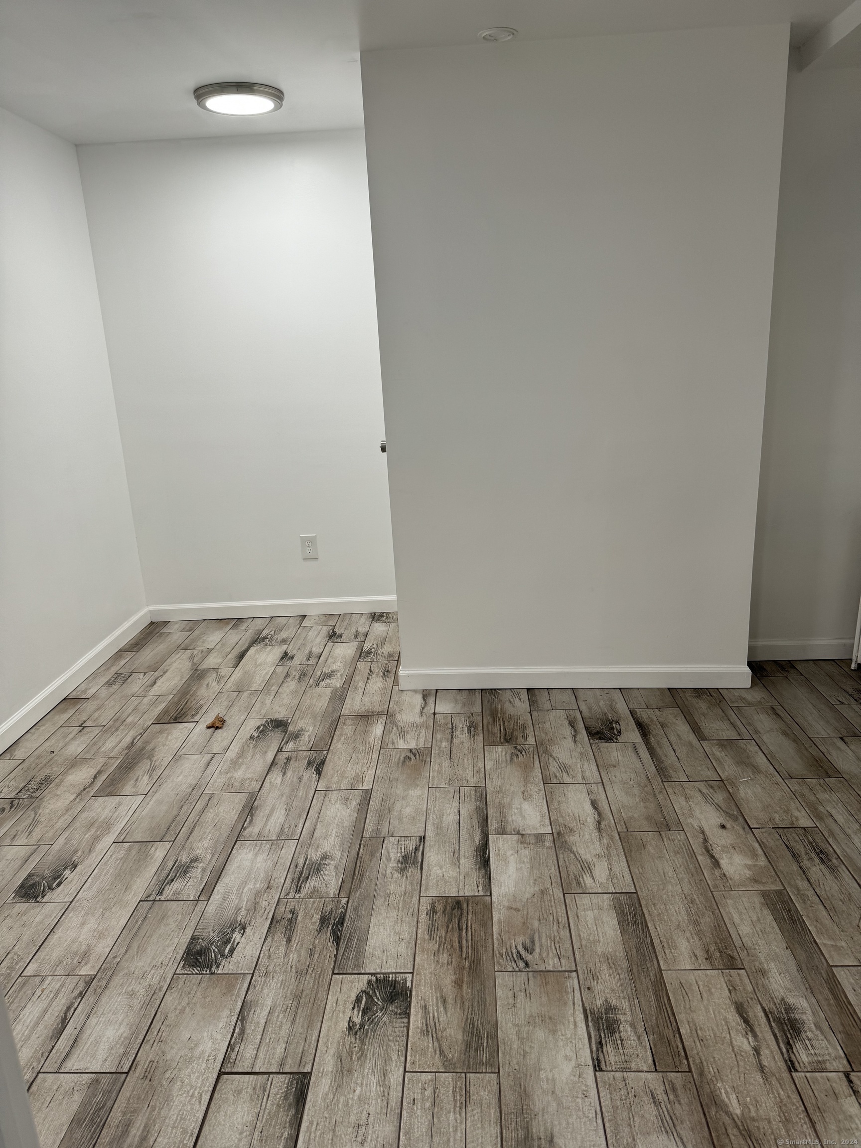 52 Pearl Street, Unit GARDEN New Haven, CT 06511 - Photo 5 of 12 a view of wooden floor