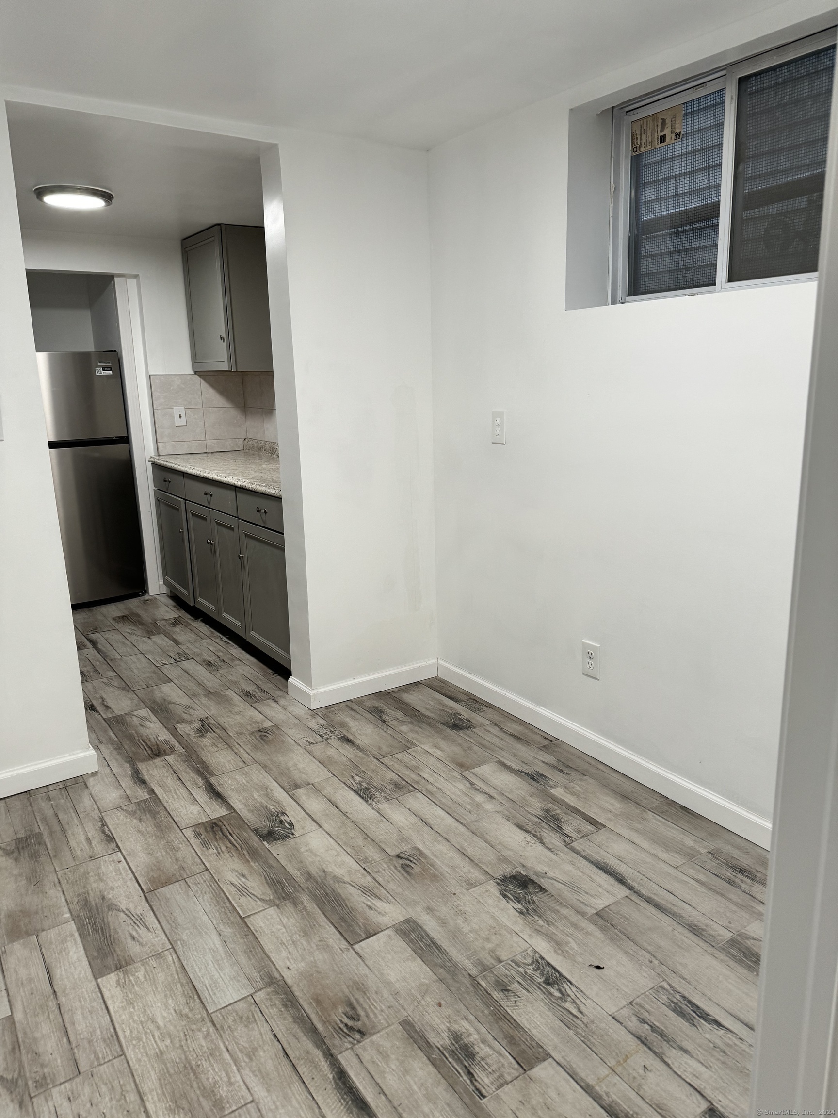 52 Pearl Street, Unit GARDEN New Haven, CT 06511 - Photo 10 of 12 a view of a refrigerator in kitchen and a sink
