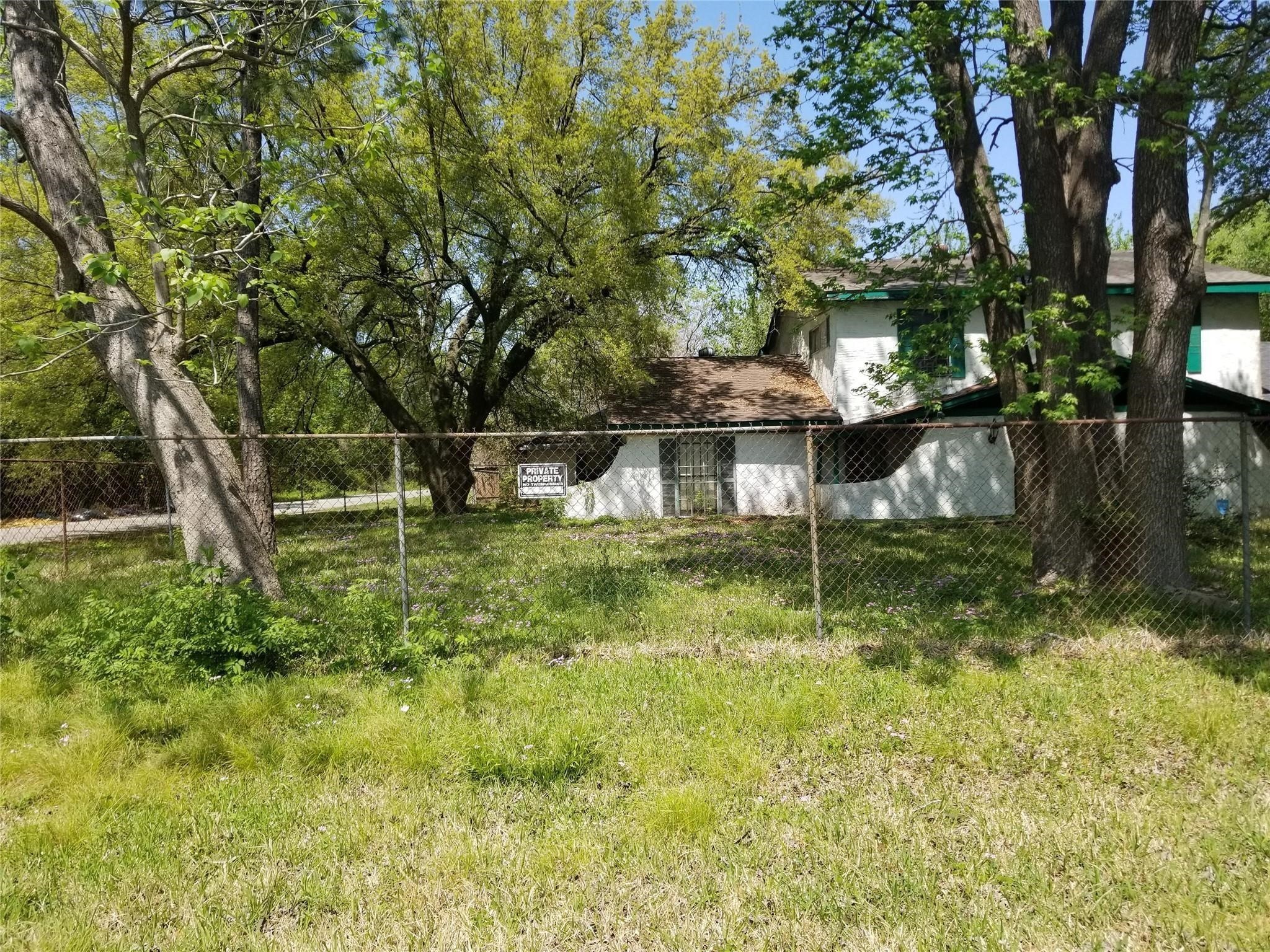 854 Junell Street Houston, TX 77088 - Photo 5 of 10 a view of house with a yard