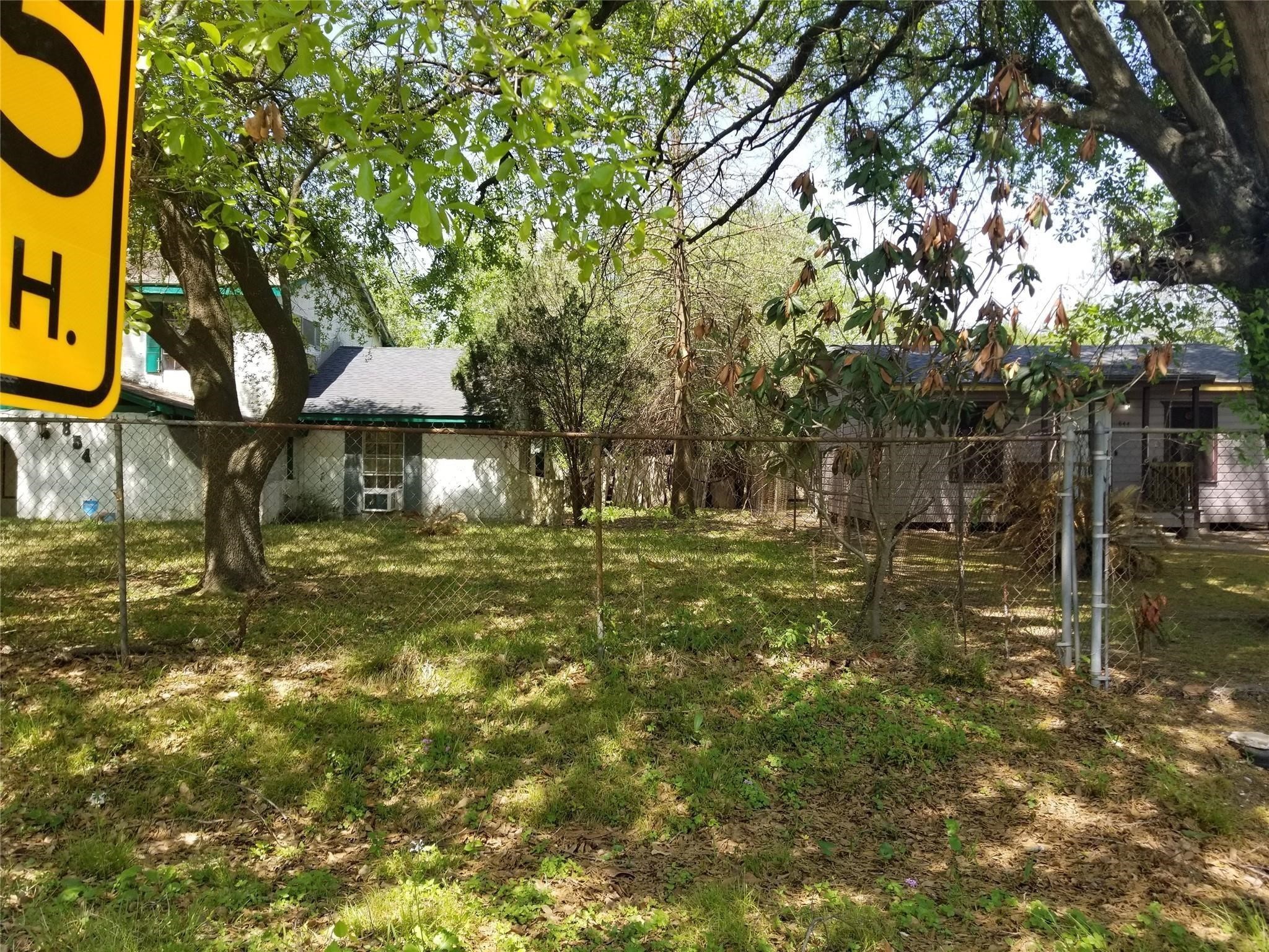 854 Junell Street Houston, TX 77088 - Photo 6 of 10 a backyard of a house with table and chairs