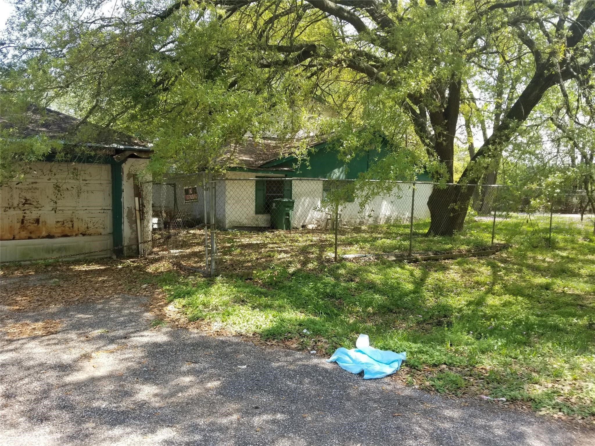 854 Junell Street Houston, TX 77088 - Photo 8 of 10 a front view of a house with a yard