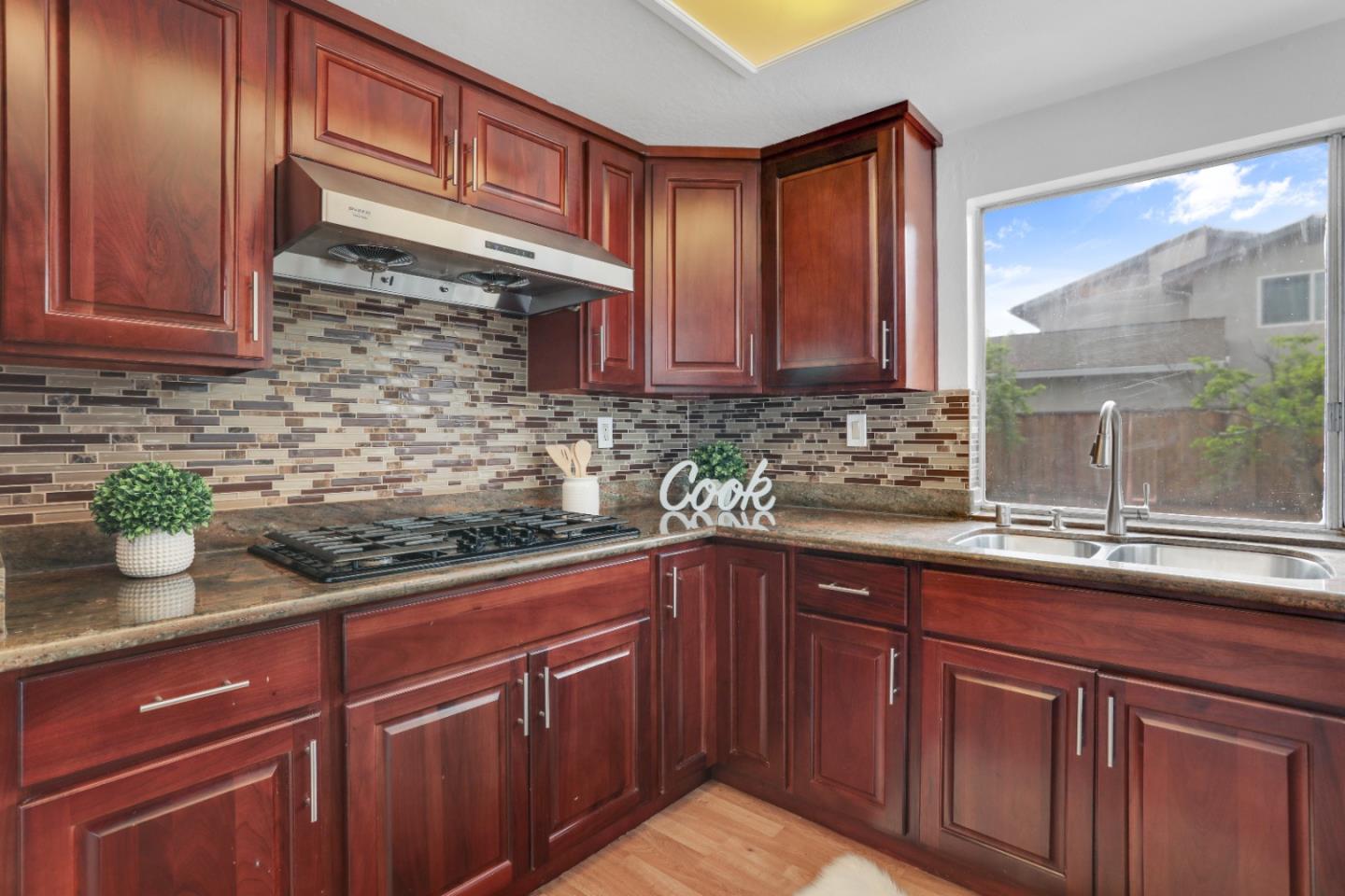537 Santander Drive San Ramon, CA 94583 - Photo 13 of 28 a kitchen with a sink cabinets and window