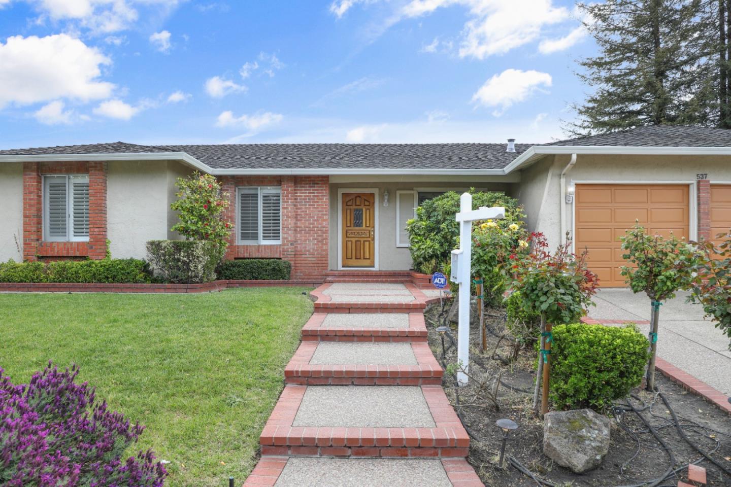 537 Santander Drive San Ramon, CA 94583 - Photo 4 of 28 a front view of a house with a garden