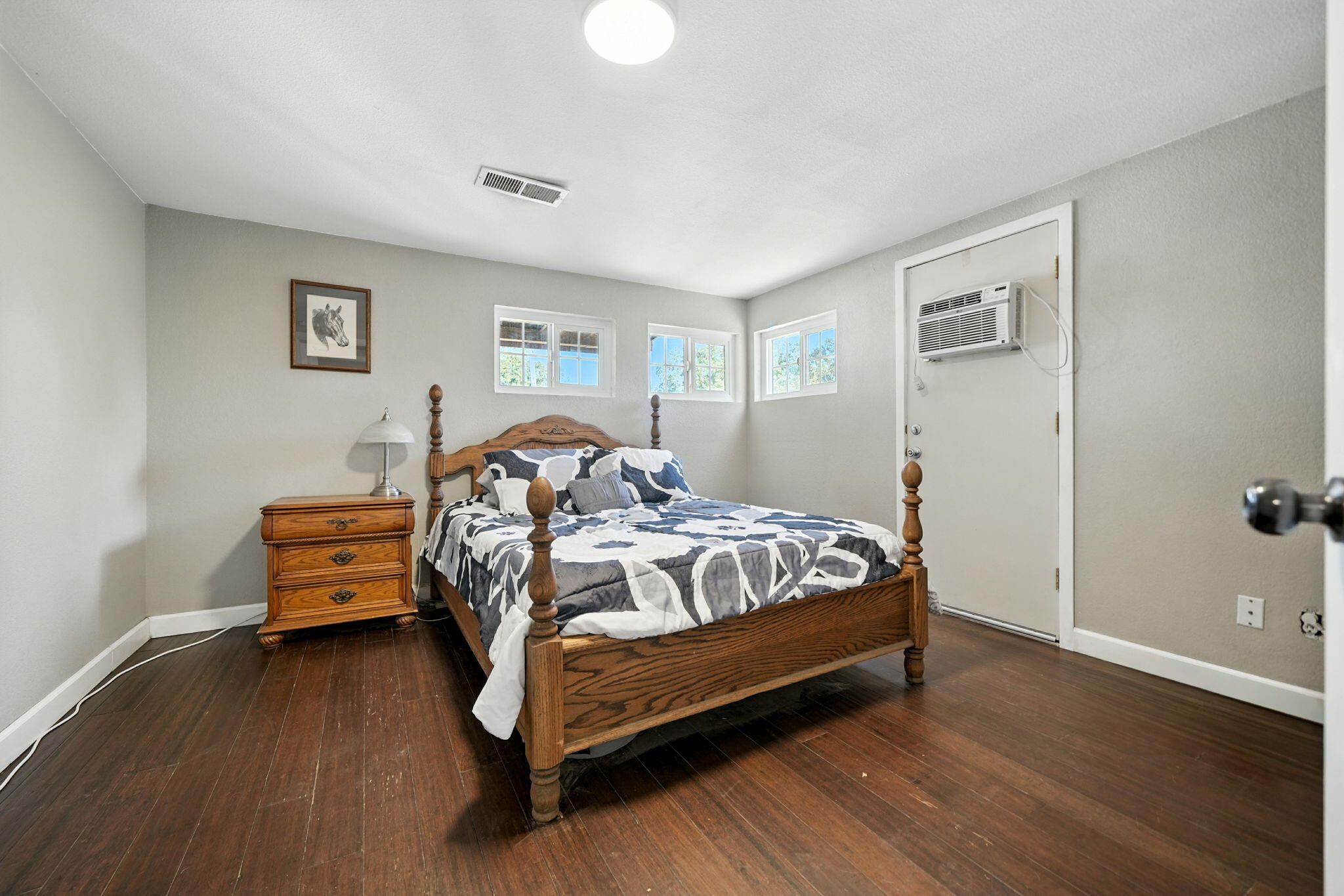 22945 Adobe Road Cottonwood, CA 96022 - Photo 12 of 40 a bedroom with a bed and a couch