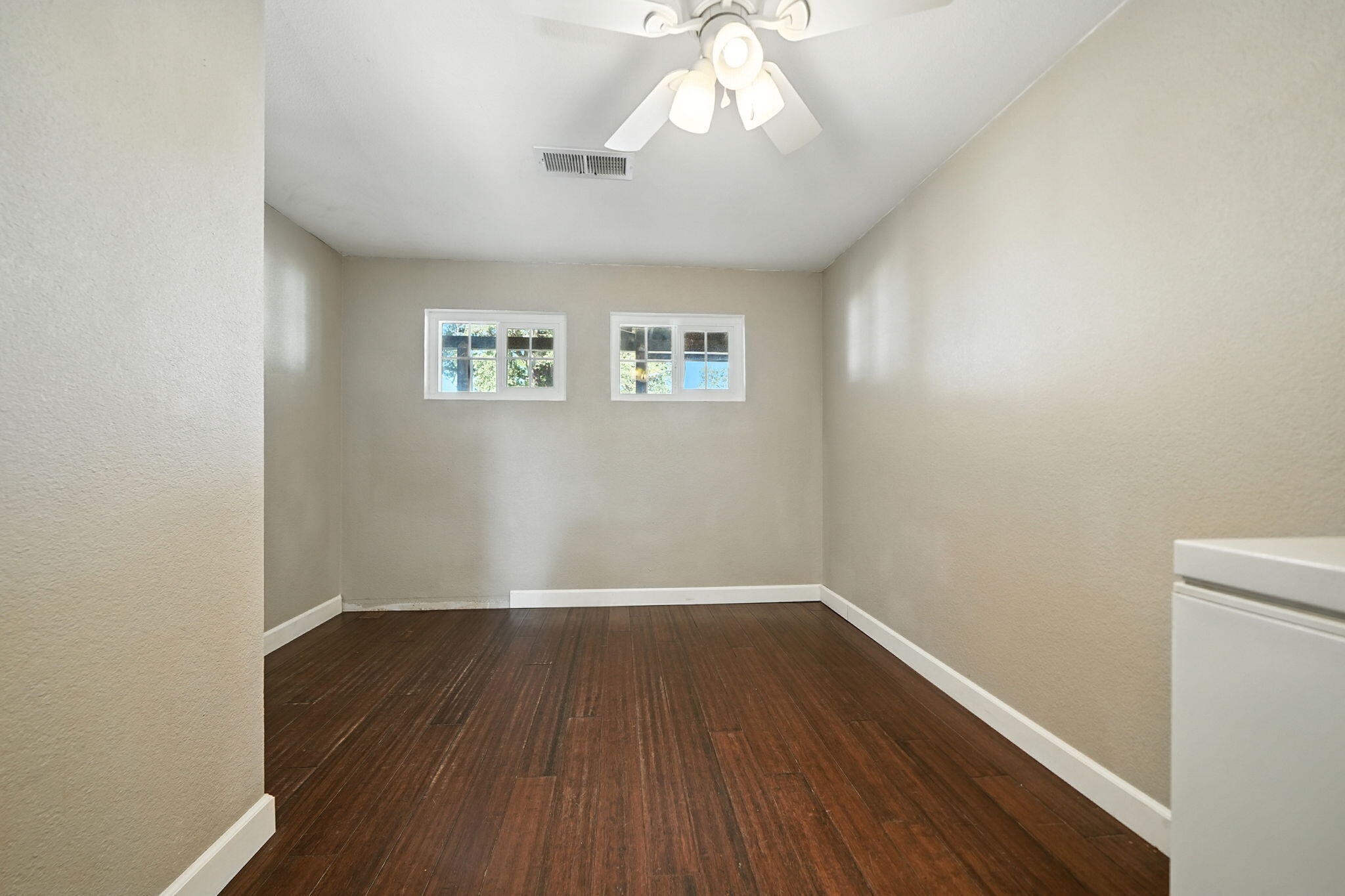 22945 Adobe Road Cottonwood, CA 96022 - Photo 14 of 40 a view of wooden floor in an empty room