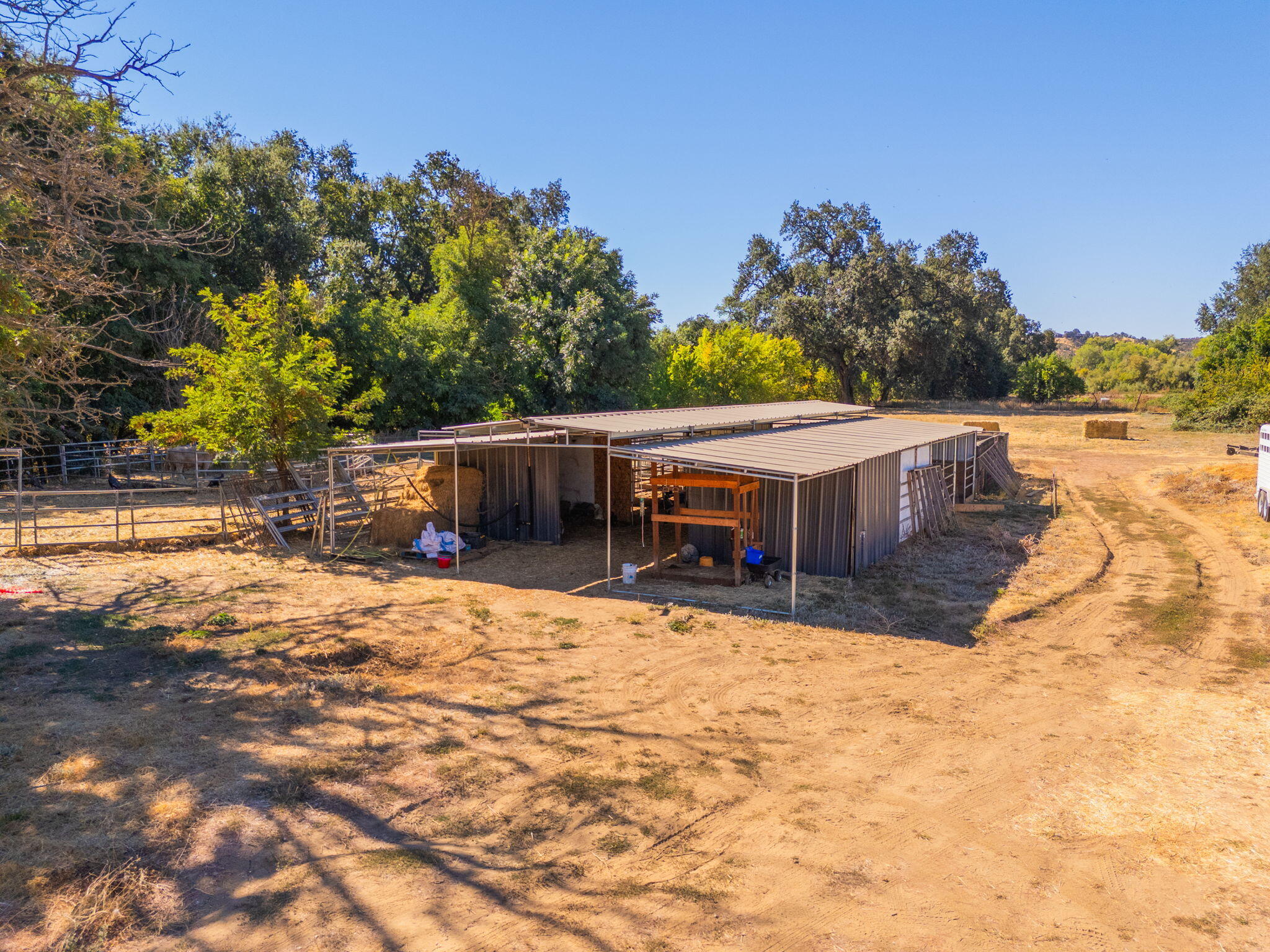 22945 Adobe Road Cottonwood, CA 96022 - Photo 21 of 40 a view of a house with yard and sitting area