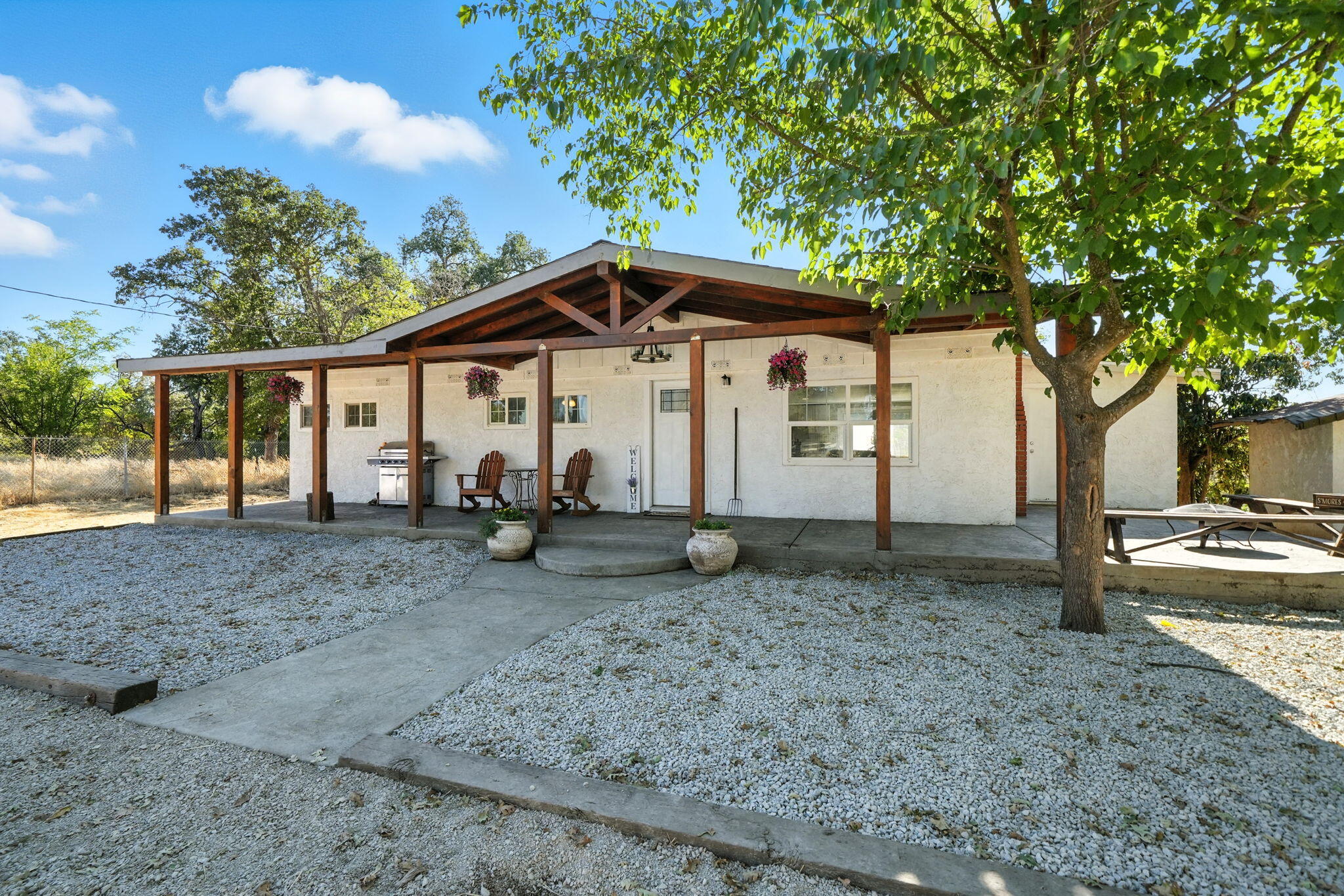 22945 Adobe Road Cottonwood, CA 96022 - Photo 25 of 40 a view of a house with backyard