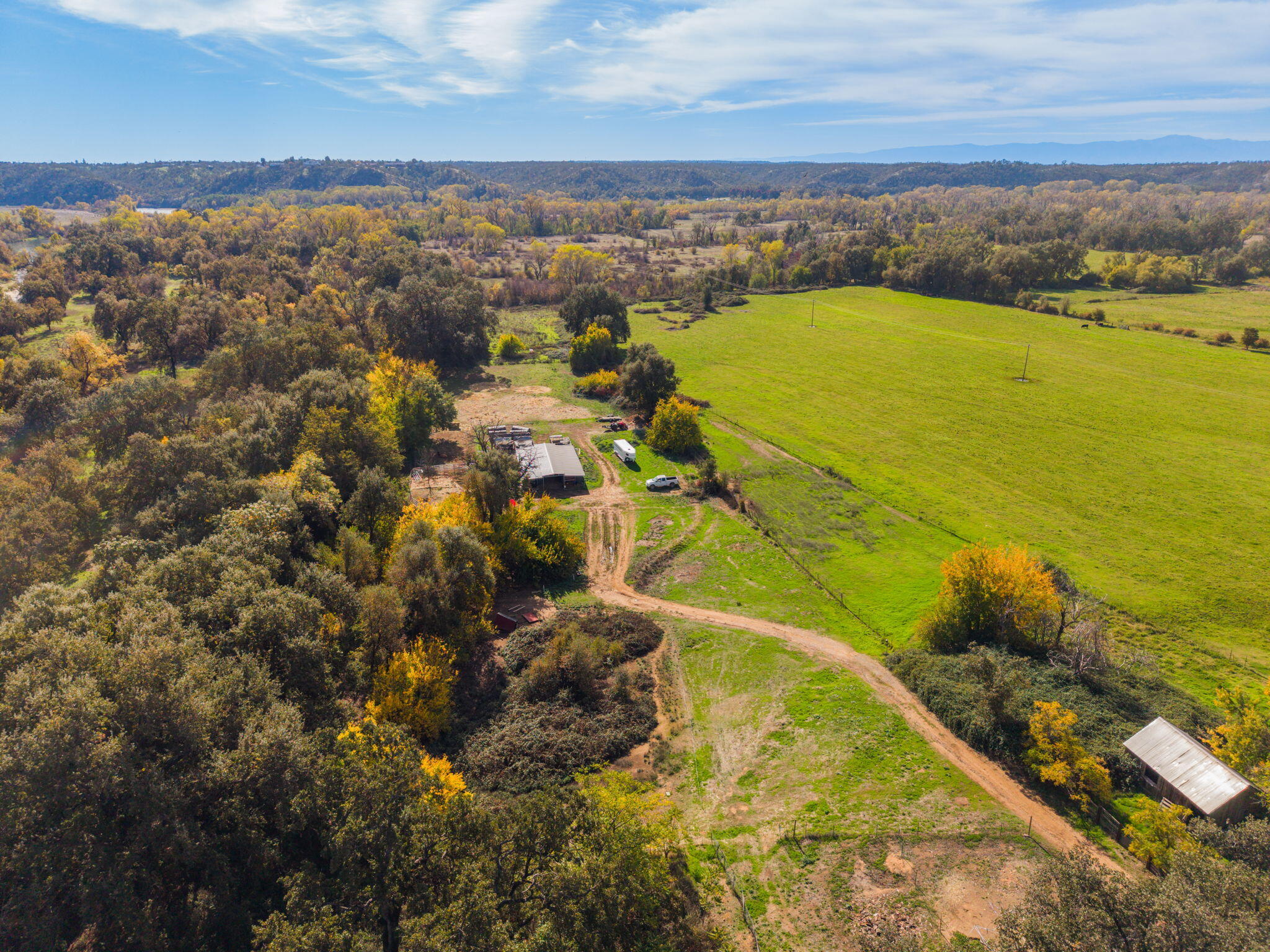 22945 Adobe Road Cottonwood, CA 96022 - Photo 38 of 40 an aerial view of residential houses with outdoor space