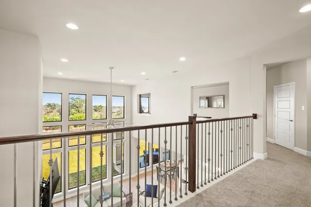 a view of hallway with a large window