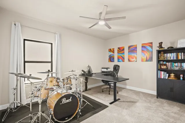 a view of a workspace with furniture