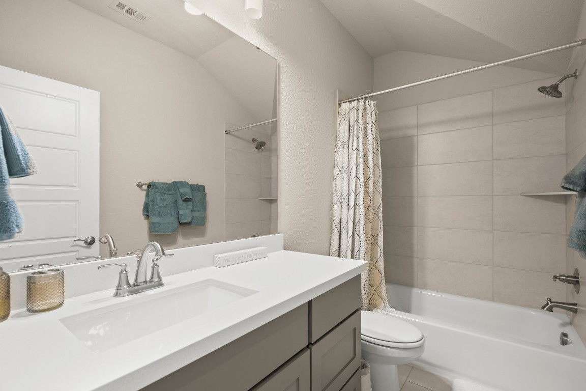 108 Rosetta Loop Liberty Hill, TX 78642 - Photo 35 of 40 a bathroom with a sink and a mirror