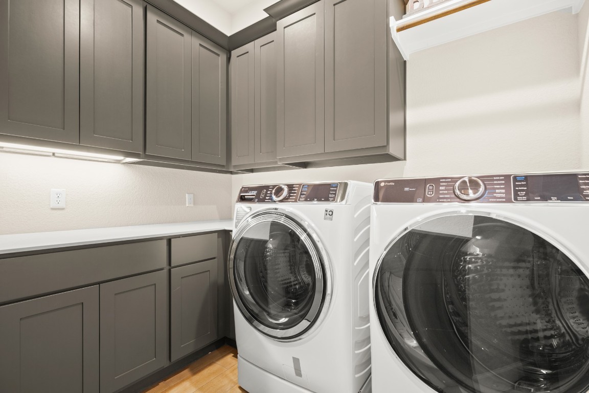 108 Rosetta Loop Liberty Hill, TX 78642 - Photo 37 of 40 a utility room with dryer and washer