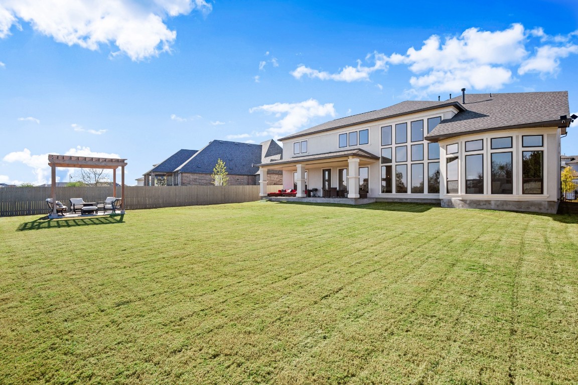 108 Rosetta Loop Liberty Hill, TX 78642 - Photo 40 of 40 a view of a house with swimming pool and sitting area