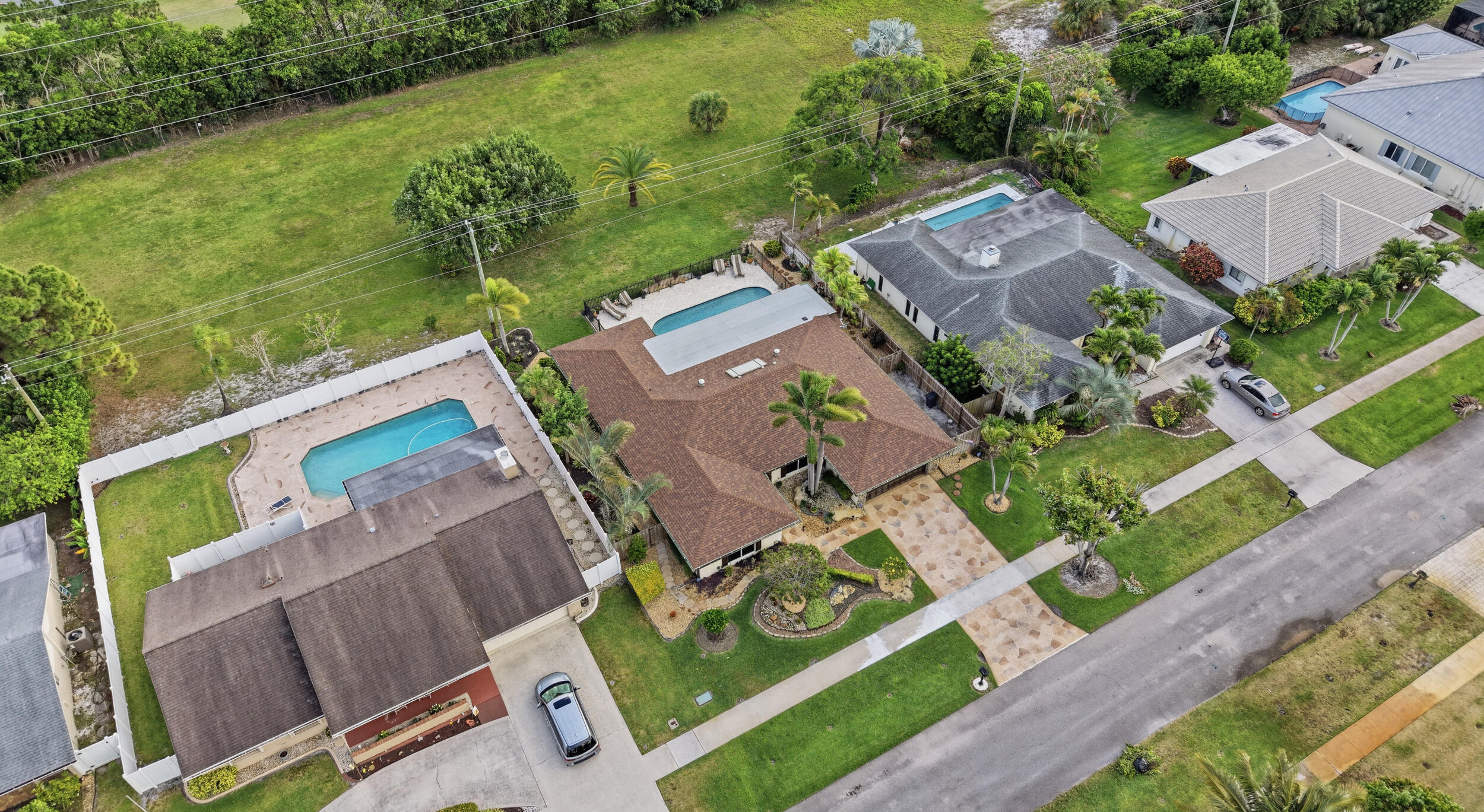 4780 Brandywine Drive Boca Raton, FL 33487 - Photo 40 of 43 an aerial view of residential house with outdoor space and lake view