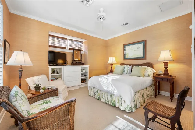 a bedroom with bed and window