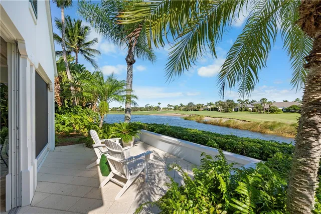 a view of a lake with a garden