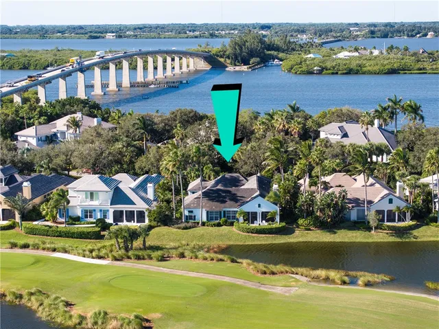 a view of a house with a ocean view