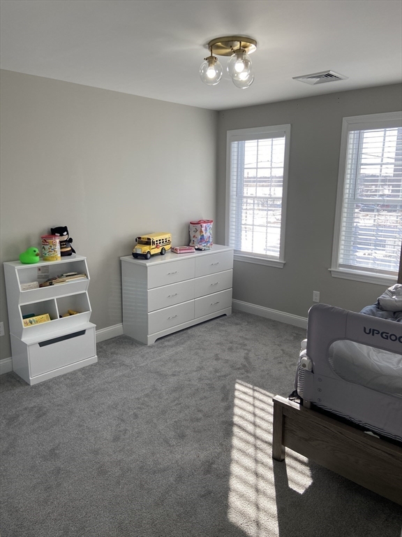 234 Kilburn Street Fall River, MA 02724 - Photo 27 of 36 a room with furniture and a window