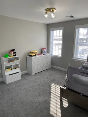 a room with furniture and a window