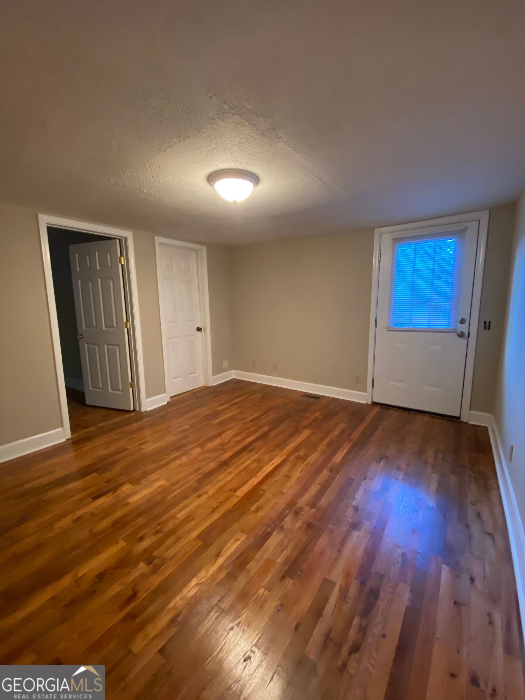 1800 Timothy Road Athens, GA 30606 - Photo 5 of 12 a view of empty room with wooden floor