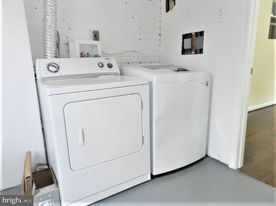 12837 Flack Street Silver Spring, MD 20906 - Photo 26 of 34 Large main level laundry room