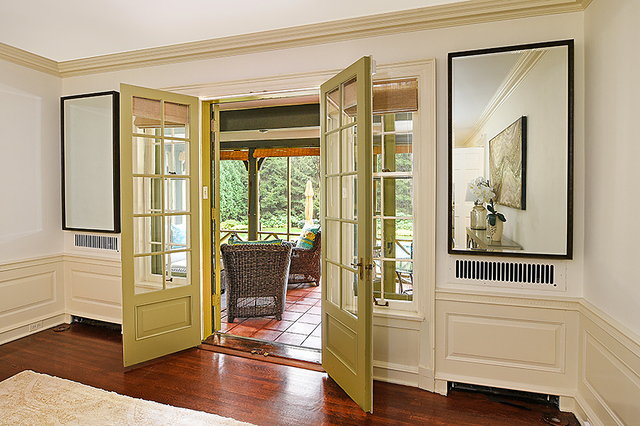 600 Ash Street Winnetka, IL 60093 - Photo 15 of 56 a view of a hallway with wooden floor and cabinet