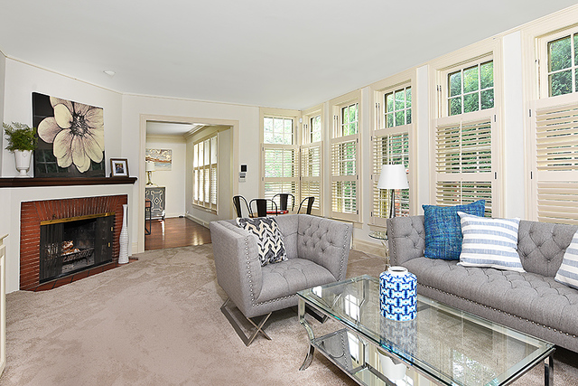 600 Ash Street Winnetka, IL 60093 - Photo 20 of 56 a living room with furniture and a fireplace