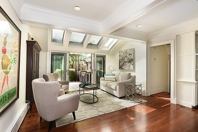 600 Ash Street Winnetka, IL 60093 - Photo 22 of 56 a living room with furniture large window and wooden floor