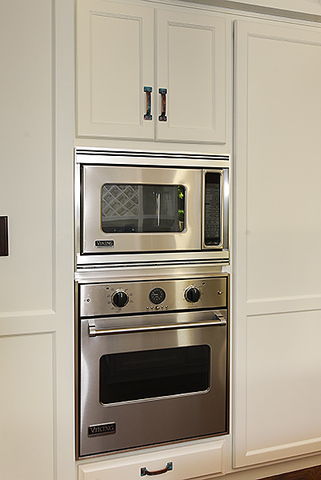 600 Ash Street Winnetka, IL 60093 - Photo 27 of 56 a stove top oven sitting inside of a kitchen