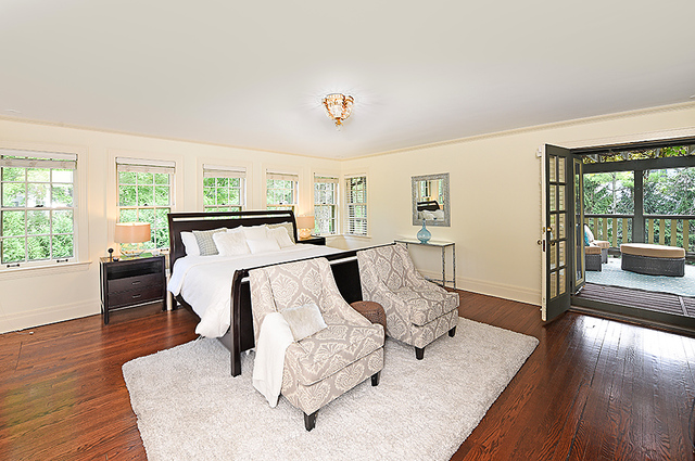 600 Ash Street Winnetka, IL 60093 - Photo 33 of 56 a bedroom with furniture and wooden floor