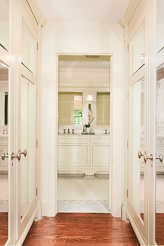 600 Ash Street Winnetka, IL 60093 - Photo 35 of 56 a view of a bathroom with a sink and mirror