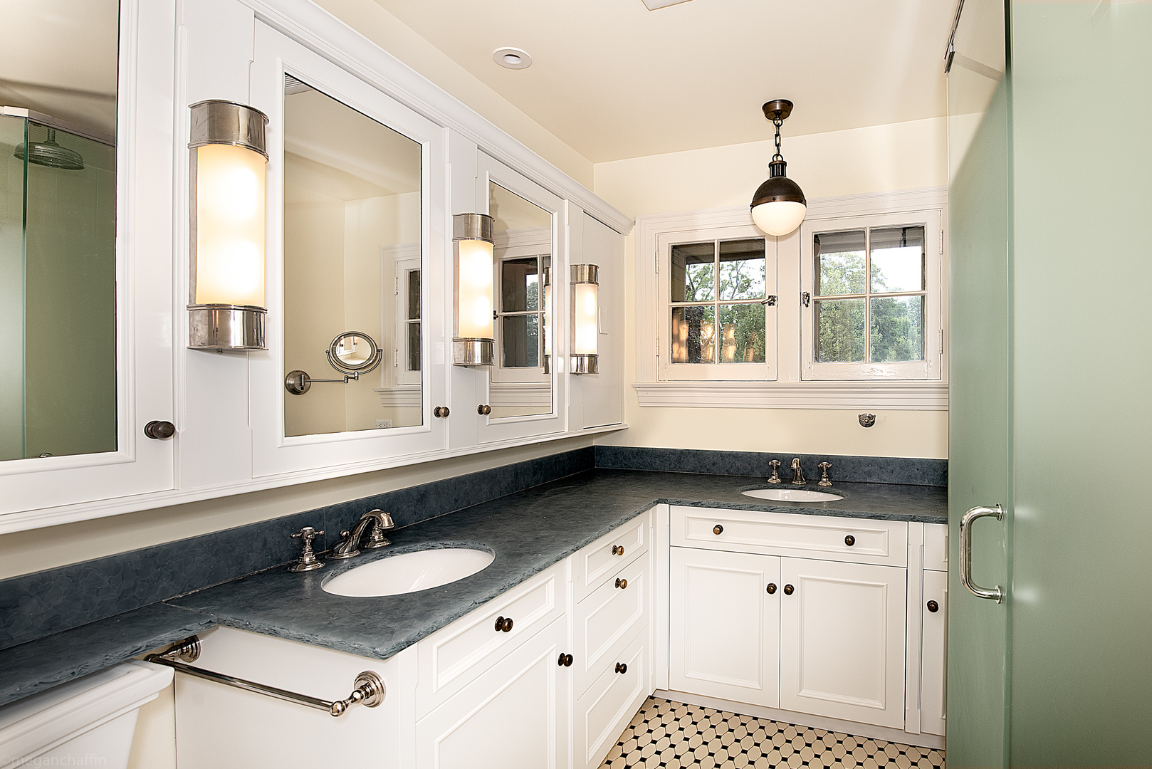 600 Ash Street Winnetka, IL 60093 - Photo 42 of 56 a bathroom with a sink and a mirror