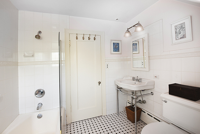 600 Ash Street Winnetka, IL 60093 - Photo 47 of 56 a bathroom with a sink a toilet and shower