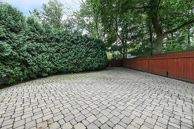 600 Ash Street Winnetka, IL 60093 - Photo 48 of 56 a backyard of a house