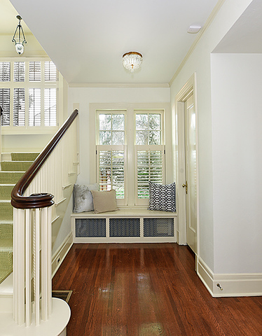 600 Ash Street Winnetka, IL 60093 - Photo 6 of 56 a view of entryway with wooden floor and stairs