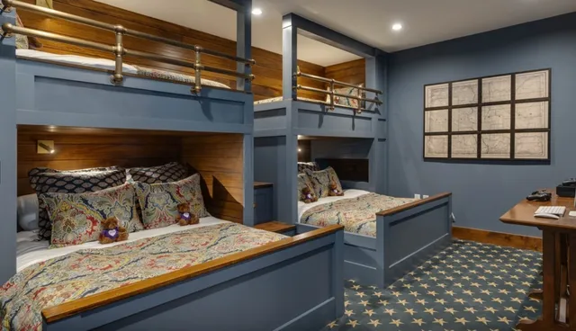 a bedroom with bed and a window