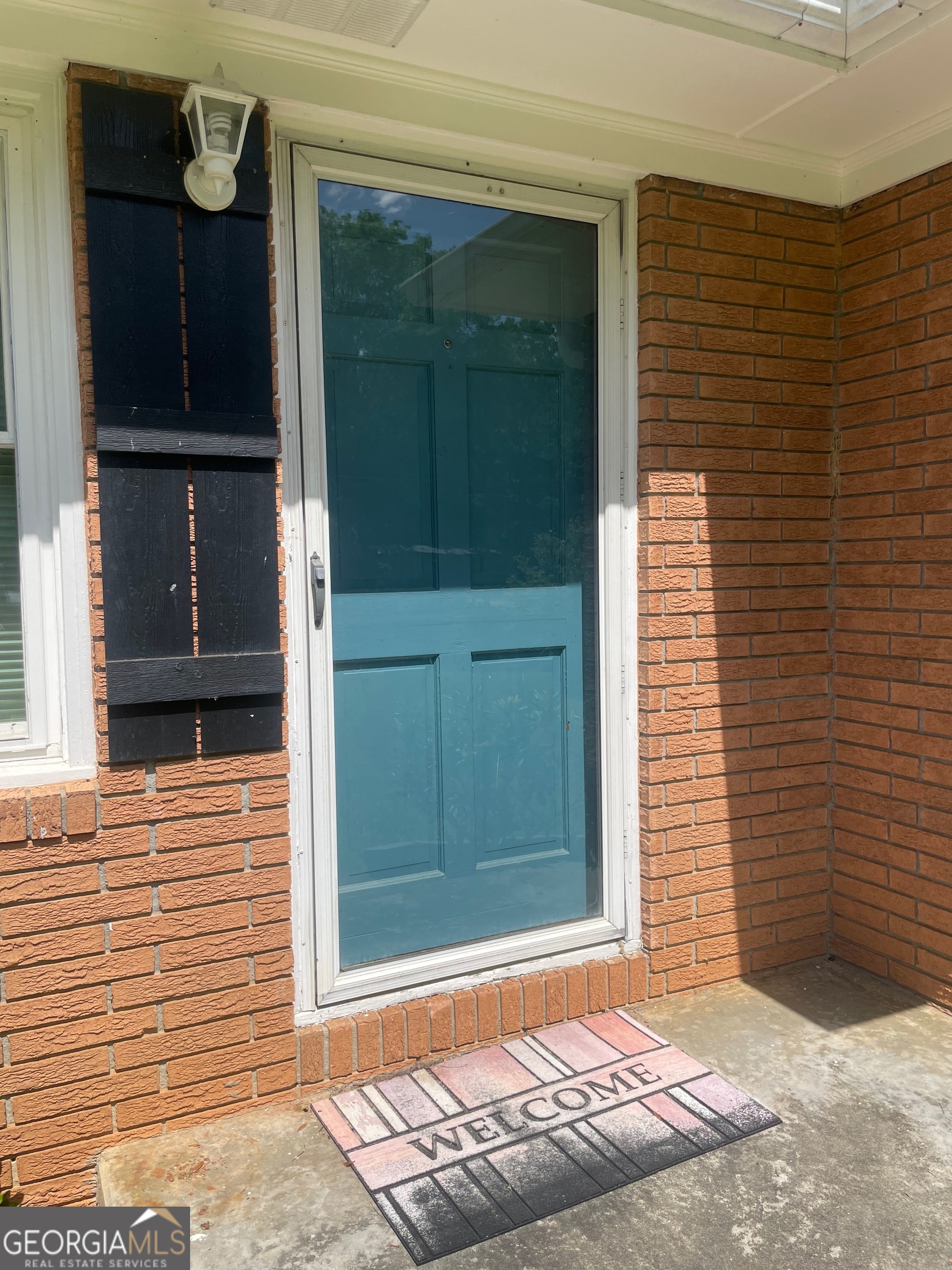 215 Old Mize Road Toccoa, GA 30577 - Photo 12 of 43 a front view of a house with a door